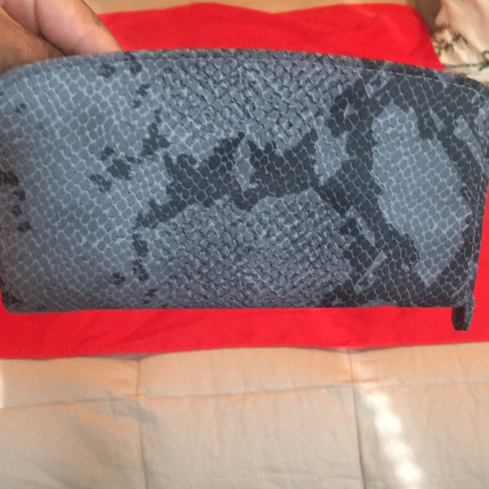 LIZ Claiborne ladies wallet in grayish.